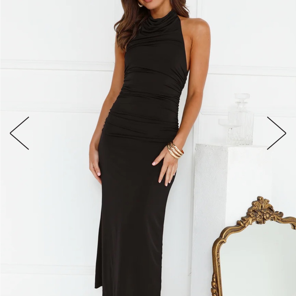 XS high neck halter style black dress. Belt not included. Sophisticated and sexy